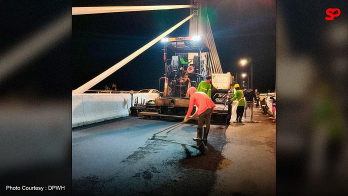 DPWH starts repair of damaged asphalt on Panguil Bay Bridge