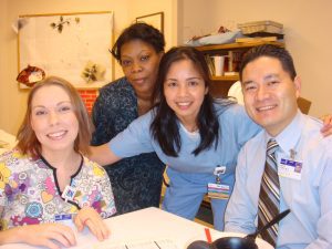 Richie Carrido, RN, with her healthcare team at Kernan Ortho and Rehab Hospital (now University of Maryland Rehabilitation & Orthopedic Institute), USA — before her return to the Philippines. She later came back to the United States as Grandison's 300th nurse through the Grandison Secure Placement Program.